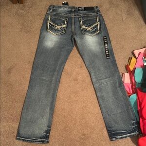 Rock Revival Blue Straight Leg Jeans with Vintage Distressing